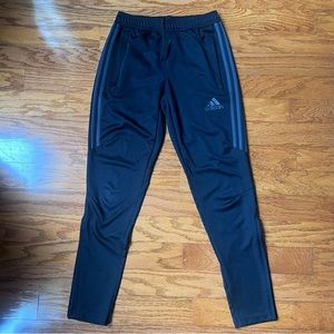 - Adidas Men’s small black track pants with gray stripe and two pockets